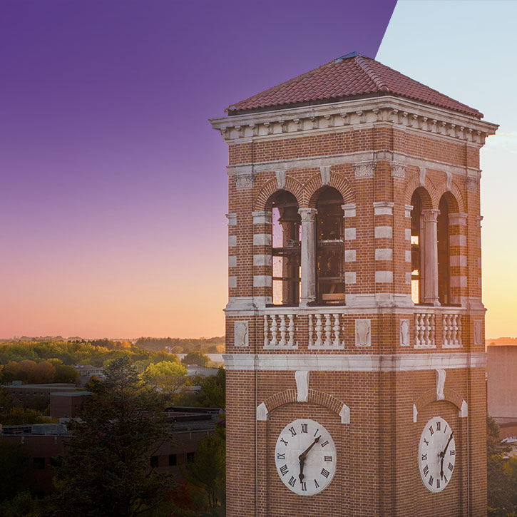 UNI Campanile at sunset with a purple gradient sky