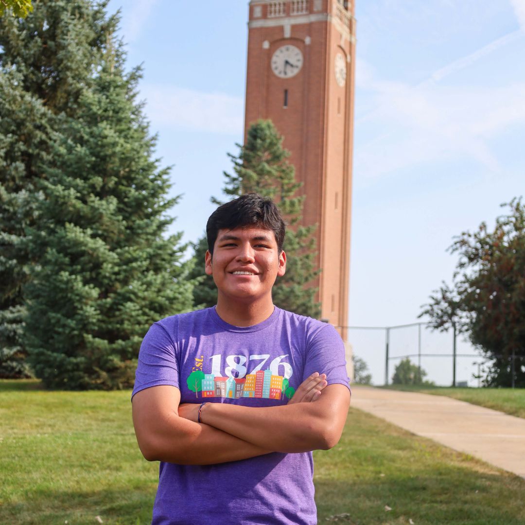 Sebastian standing in front of the Campanile.