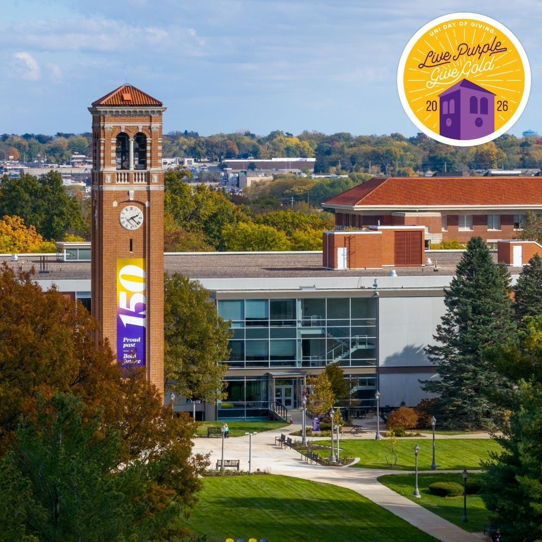 An aerial view of the Campanile with the Live Purple Give Gold logo in the top right corner.