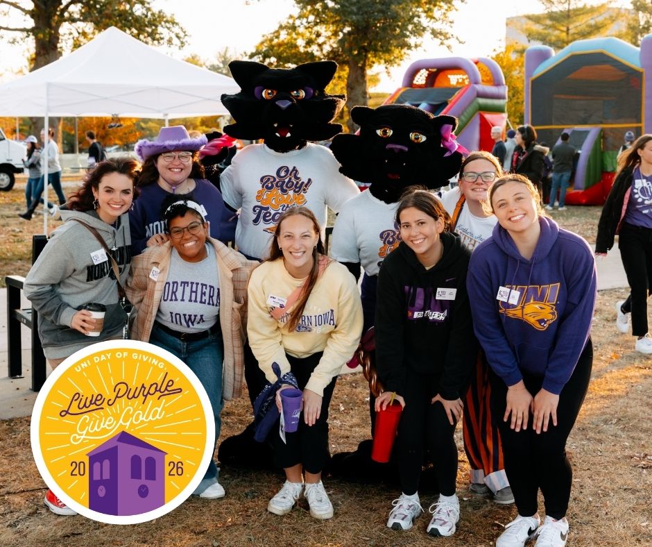 A group of students with TC and TK with the Live Purple Give Gold logo in the bottom left corner.