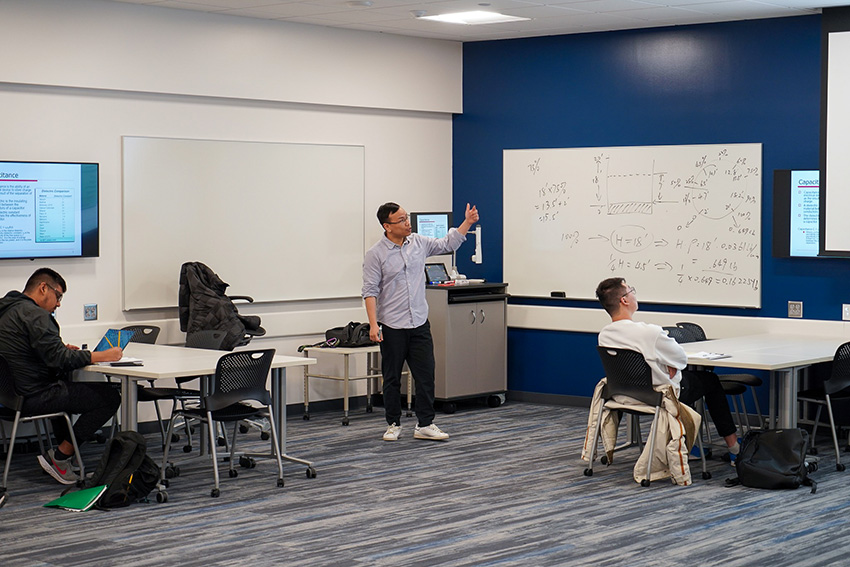 UNI professor teaching a class in a new classroom in the Applied Engineering Building